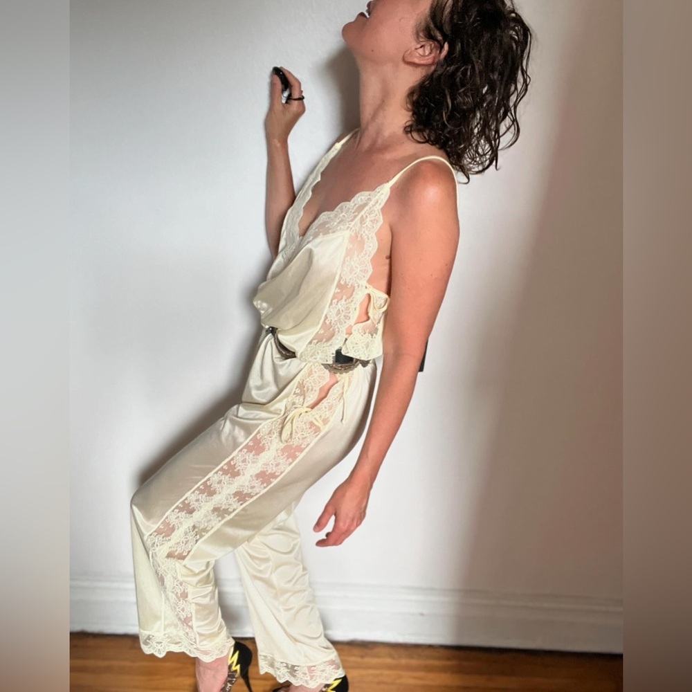 Lingerie jumpsuit made of nylon and lace with cute ties on the side. Open size. - Picture 8 of 14